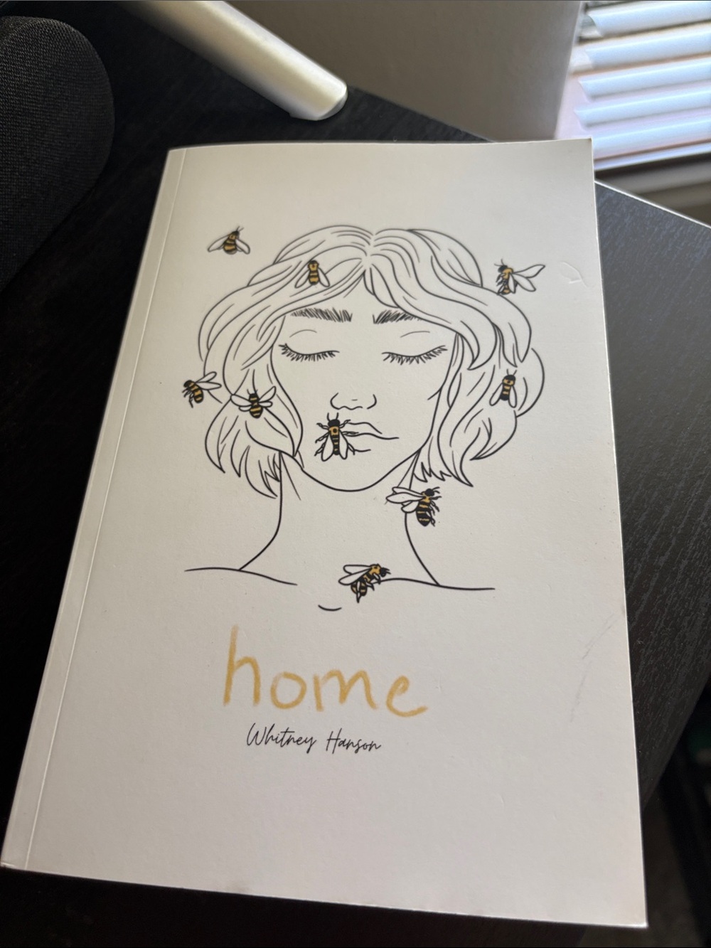 Home paperback book with bee illustration - white and gold